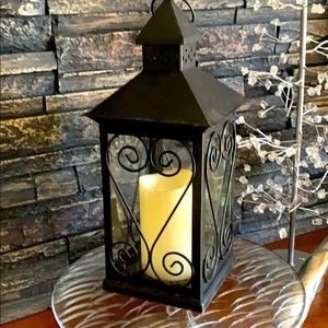Black hanging lantern wrought iron with candle